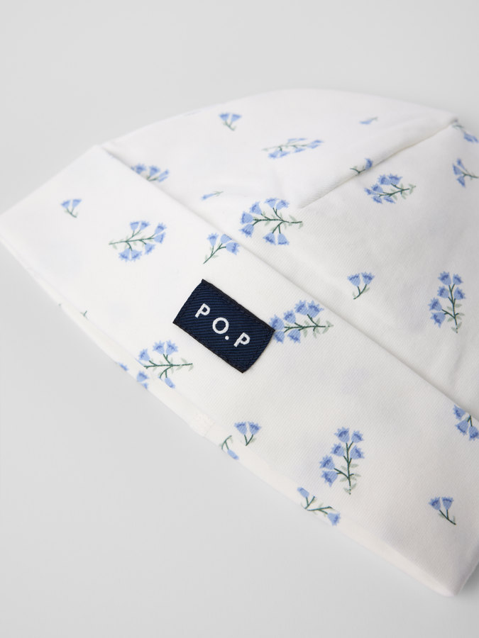 Trikåmössa blommig