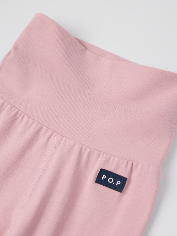 Byxa med nedvikbara muddar