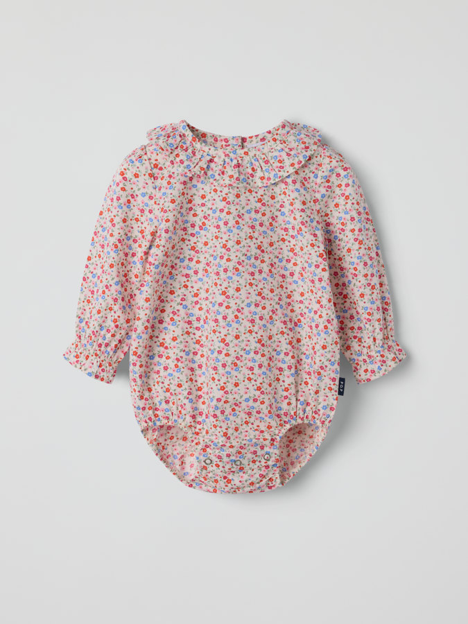 Långärmad body blommig Långärmad body blommig