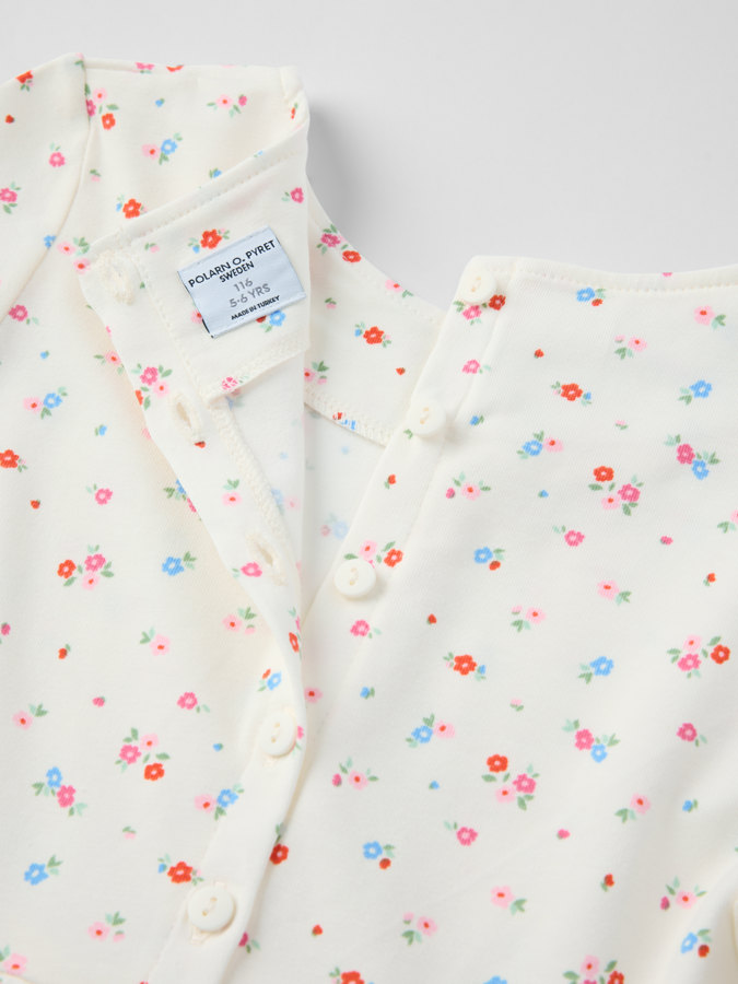 Snurrklänning blommig Snurrklänning blommig