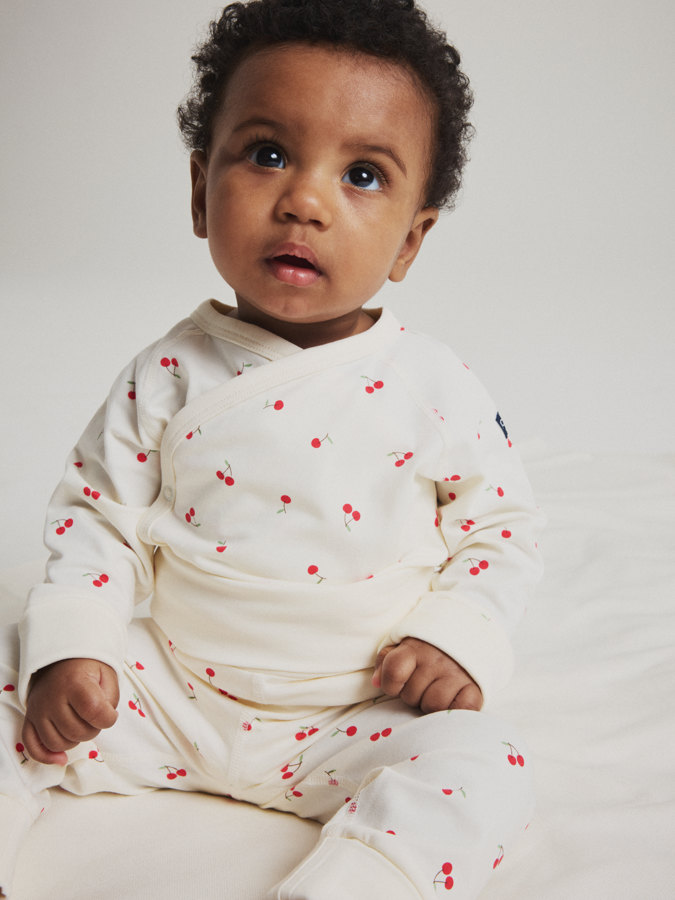 Förlängningsbar omlottbody körsbär