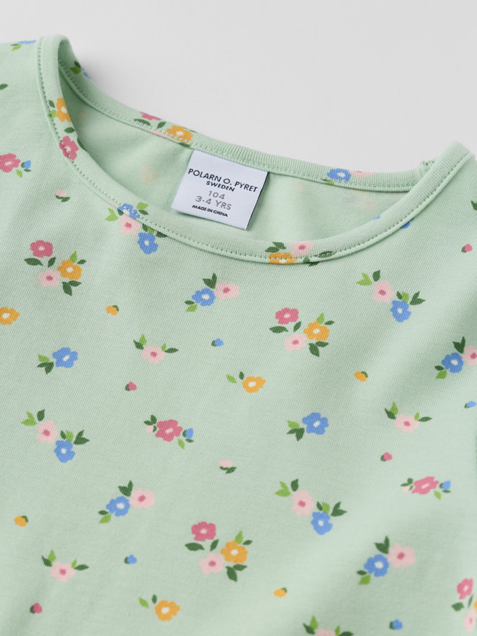 Långärmad klänning blommig